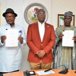 left Engr. Simbi Wabote, Executive Secretary, NCDMB, Chief Timipre Sylva, Honourable Minister of State Petroleum Resources, Mallam Mele Kyari, Group Managing Director, NNPC, at the signing ceremony.