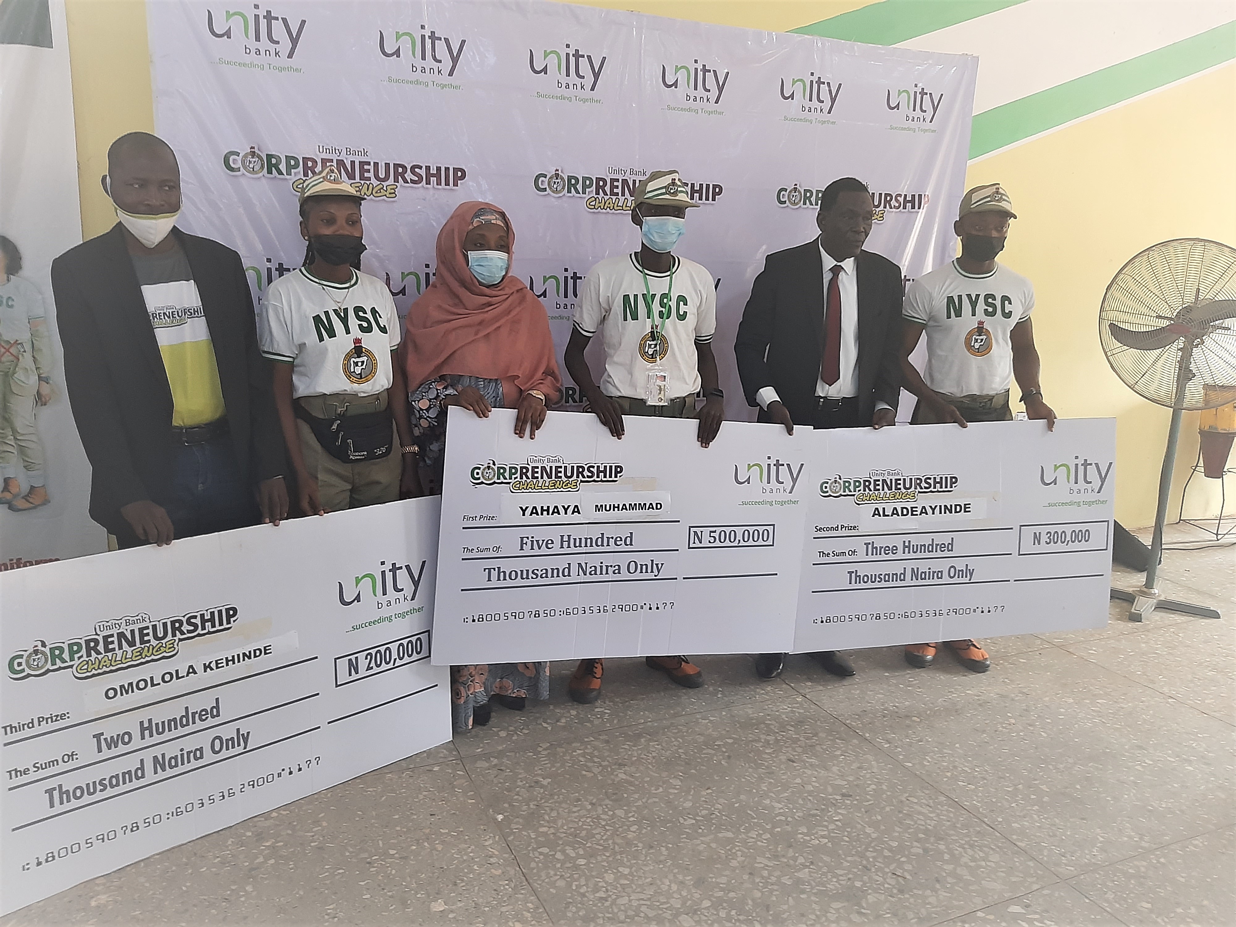 From left: Mr. Kabir Mashi, Regional Manager, North West, Unity Bank Plc, Omolola Kehinde, 2nd runner up, Aisha Tata Mohammed, Kano State NYSC Coordinator, Yahaya Muhammad, the overall winner, Mr. Mustapha Idris Baba, Zonal Head, North West, Unity Bank Plc and Alade Ayinde, the first runner up in the 6th edition of the NYSC Corpreneurship Challenge held in Kano last week.