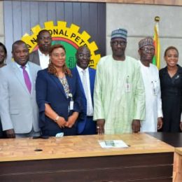 The Group Managing Director of the Nigerian National Petroleum Corporation (NNPC), Mallam Mele Kyari (middle) flanked by members of the Board of the NNPC Greenfield Refinery Limited (NGRL),